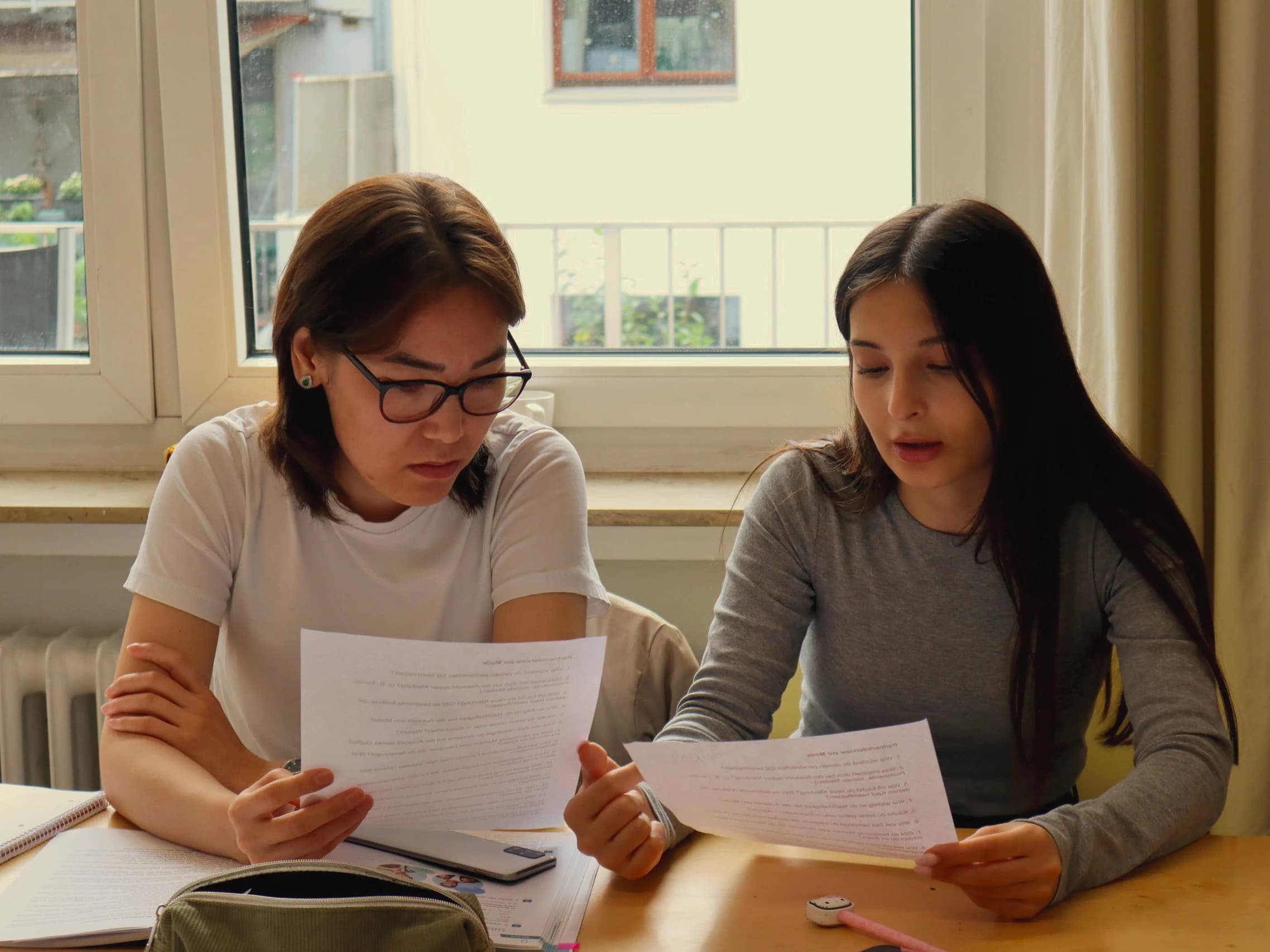 Two learners going through a text together